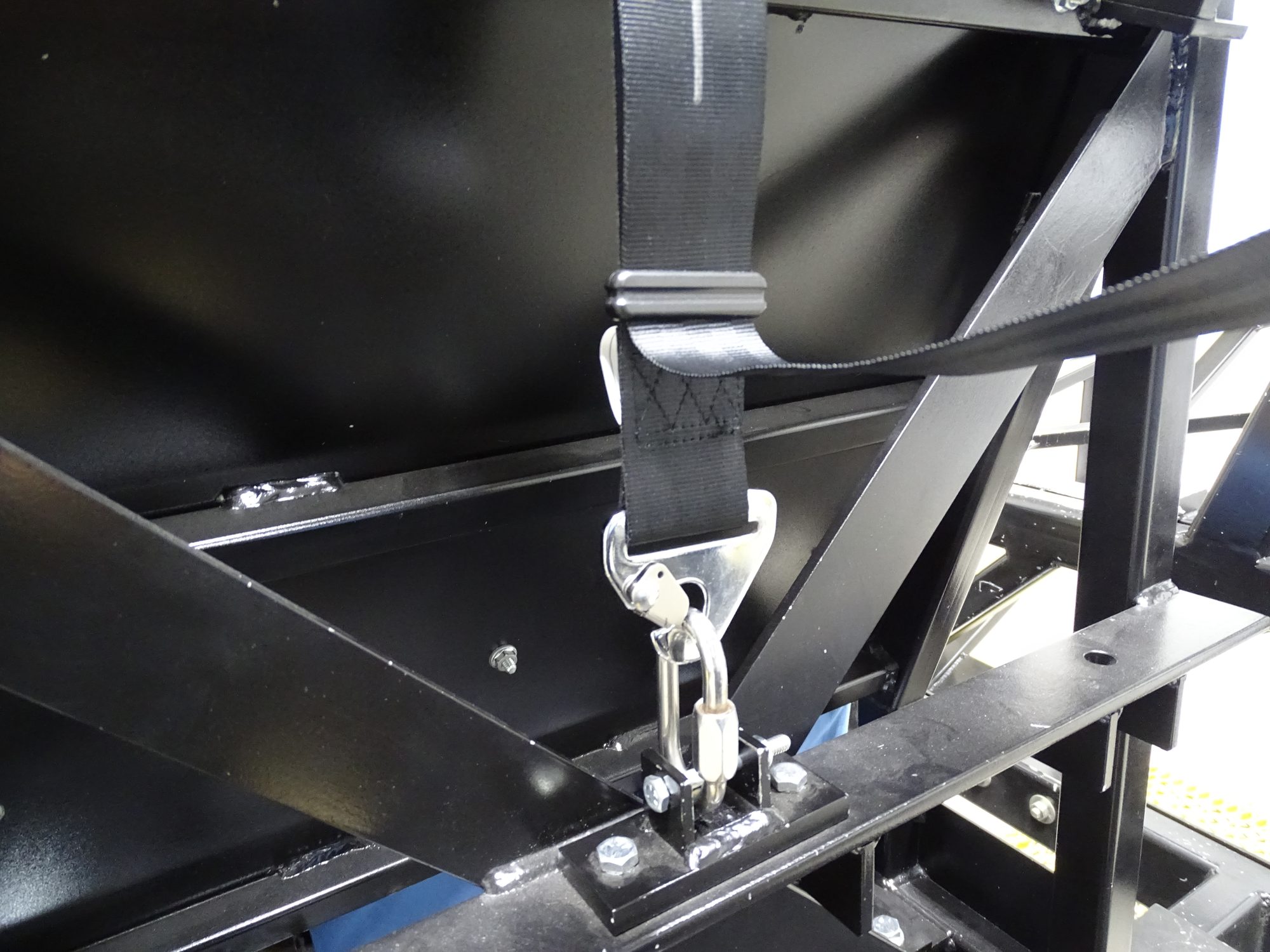 Close-up of the LATCH anchor hardware securing the PupTent to the sled.